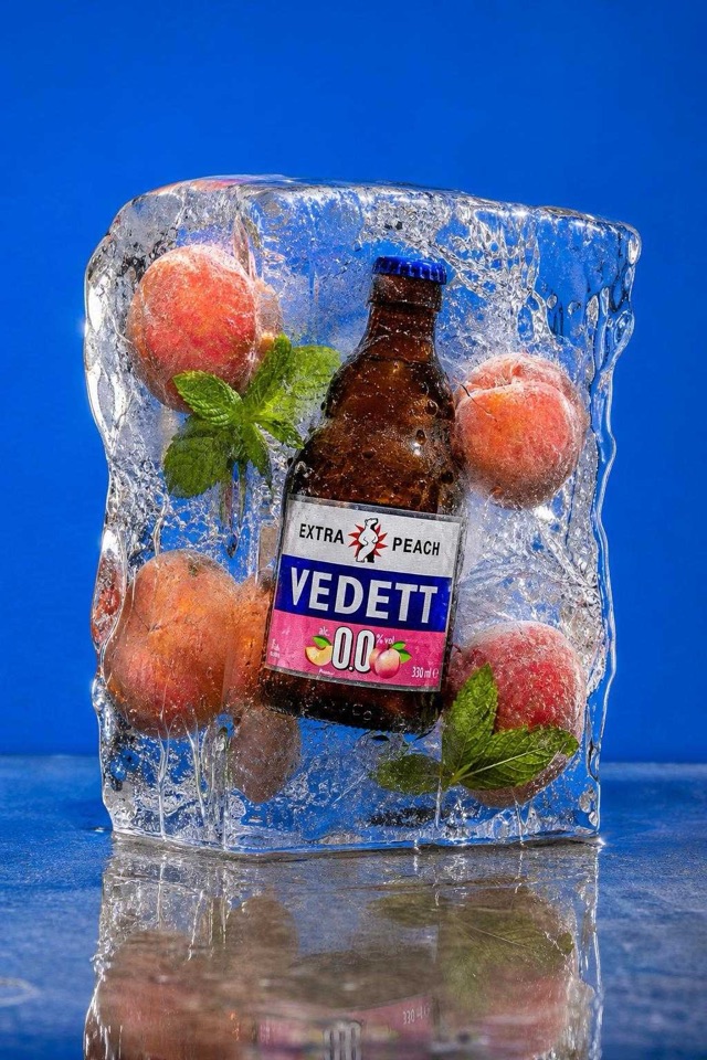 AI campaign look: the same bottle frozen inside a block of ice